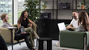 Group of four people sitting in a WPP office